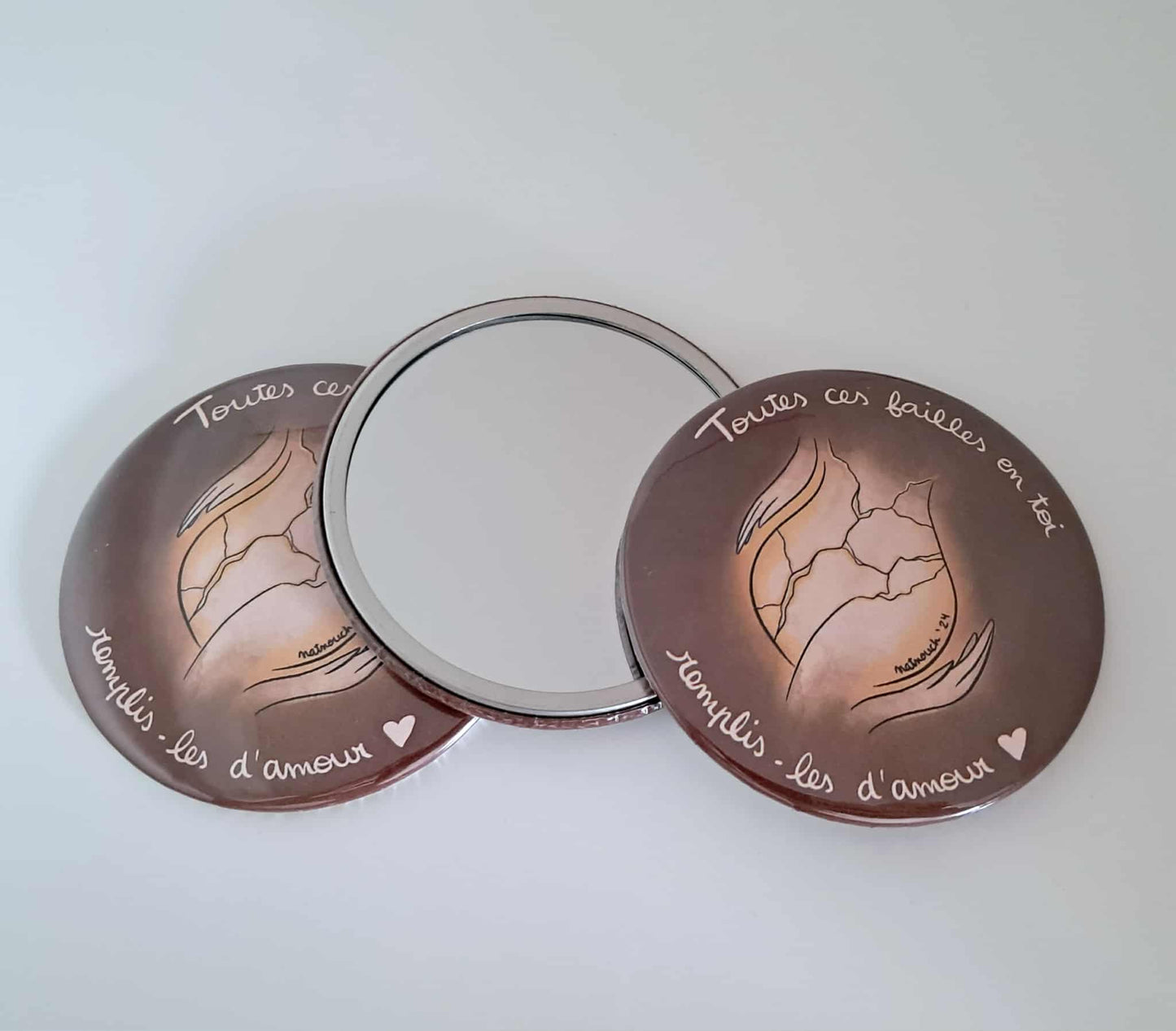 Miroir de poche "Toutes ces failles en toi, remplis-les d'amour."